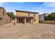 Expansive backyard featuring a covered patio, perfect for outdoor entertaining and relaxation at 1695 E Mia Ln, Gilbert, AZ 85298
