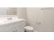 Clean, modern bathroom with white vanity, toilet, and neutral color palette at 18792 E Panchito Dr, Gold Canyon, AZ 85118
