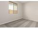 Cozy bedroom with plush carpet, neutral paint, and a bright window at 18792 E Panchito Dr, Gold Canyon, AZ 85118