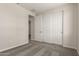 Bedroom showcases neutral walls, plush carpet, and a closet with sliding doors at 18792 E Panchito Dr, Gold Canyon, AZ 85118