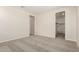 Spacious bedroom featuring plush carpet, neutral paint, and access to a walk-in closet at 18792 E Panchito Dr, Gold Canyon, AZ 85118