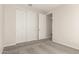 This bedroom has carpeted floors and a closet with sliding doors, offering comfort and practicality at 18792 E Panchito Dr, Gold Canyon, AZ 85118