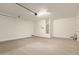This two car garage features a clean concrete floor, water heater and access door at 18792 E Panchito Dr, Gold Canyon, AZ 85118
