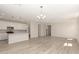 Open living space flows seamlessly into the kitchen, flooded with natural light at 18792 E Panchito Dr, Gold Canyon, AZ 85118