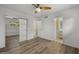 Bedroom with wood-look floors and an en-suite bathroom at 4555 N 5Th Ave, Phoenix, AZ 85013