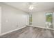 Well lit bedroom featuring two windows with ample sunlight at 11133 W Cameo Dr, Sun City, AZ 85351