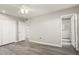 Bedroom with closet, natural light, and ensuite bathroom at 11133 W Cameo Dr, Sun City, AZ 85351