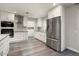 Beautiful kitchen featuring stainless steel refrigerator and modern appliances at 11133 W Cameo Dr, Sun City, AZ 85351