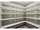 Spacious walk-in pantry with ample shelving and storage at 11133 W Cameo Dr, Sun City, AZ 85351
