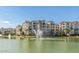 Exterior view of buildings by lake and fountain at 2511 W Queen Creek Rd # 205, Chandler, AZ 85248