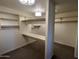 Bright walk-in closet offering extensive storage options at 4526 E Vista Bonita Dr, Phoenix, AZ 85050