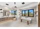 This bright bathroom features a free-standing tub, windows with desert views, and dual sinks at 9989 E Aleka Way # 337, Scottsdale, AZ 85262