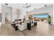 Expansive living area featuring a fireplace and large windows offering views of the outdoor scenery at 9989 E Aleka Way # 337, Scottsdale, AZ 85262