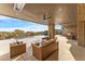 Luxury patio featuring a pool, dining area, outdoor kitchen, and comfortable seating with beautiful views of the landscape at 9989 E Aleka Way # 337, Scottsdale, AZ 85262