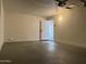 Spacious garage featuring a door leading to the interior, offering ample storage and parking at 1173 E Cordova Ave, Casa Grande, AZ 85122