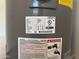 Close-up of a new water heater with a visible label showing energy efficiency and model details at 1173 E Cordova Ave, Casa Grande, AZ 85122