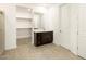 Modern bathroom with dark vanity and walk-in shower at 37034 W La Paz St, Maricopa, AZ 85138