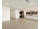 Open living space with kitchen and hallway views at 37034 W La Paz St, Maricopa, AZ 85138