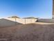 Large backyard with block wall and sandy ground at 4314 W Josephine St, San Tan Valley, AZ 85144