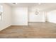 Open dining area with tile floors and modern lighting at 4314 W Josephine St, San Tan Valley, AZ 85144