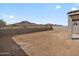 Empty backyard with mountain views at 4937 W Hunter Trl, San Tan Valley, AZ 85144