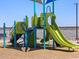 New playground with green slide, climbing structure, and seating for enjoyment at 4937 W Hunter Trl, San Tan Valley, AZ 85144