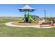 Community playground with shade and slides next to benches and walking paths at 4937 W Hunter Trl, San Tan Valley, AZ 85144