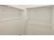 Walk-in closet with white shelving and ample storage space for clothing and accessories at 4937 W Hunter Trl, San Tan Valley, AZ 85144