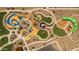 Community playground with winding paths and play areas at 1206 W J Waltz Way, Apache Junction, AZ 85120