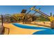 Modern playground with elevated play structure and climbing features at 1206 W J Waltz Way, Apache Junction, AZ 85120