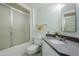 Neat bathroom featuring a shower, toilet, and modern vanity at 12442 W Marble Dr, Sun City West, AZ 85375