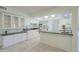 Well-lit kitchen features ample counter space and modern appliances, creating a functional and stylish cooking area at 12442 W Marble Dr, Sun City West, AZ 85375