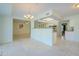 Kitchen opens to a dining area with natural lighting and tile floors at 12442 W Marble Dr, Sun City West, AZ 85375