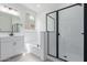 Bathroom featuring a vanity, a soaking tub, and a glass-enclosed shower at 18650 E Panchito Dr, Gold Canyon, AZ 85118