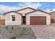 Charming single-story home with a two-car garage and desert landscaping at 18650 E Panchito Dr, Gold Canyon, AZ 85118