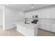 Kitchen featuring a center island, stainless steel appliances, and white cabinets at 18650 E Panchito Dr, Gold Canyon, AZ 85118