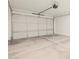 Spacious two car garage with an automatic door at 16017 W Cottontail Ln, Surprise, AZ 85387