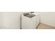 Laundry room with brand new washer and dryer at 16017 W Cottontail Ln, Surprise, AZ 85387