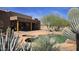 Scenic backyard pool area featuring desert plants and a lush oasis at 2926 W Tanya Trl, Phoenix, AZ 85086