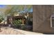 Desert home with unique architectural details, native landscaping, and a welcoming front entrance at 2926 W Tanya Trl, Phoenix, AZ 85086
