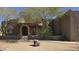 Charming desert home showcasing its unique architecture, native landscaping, and inviting curb appeal at 2926 W Tanya Trl, Phoenix, AZ 85086