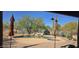 Outdoor pool area with umbrellas and desert landscaping offers a relaxing retreat at 2926 W Tanya Trl, Phoenix, AZ 85086