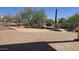 A tranquil backyard pool featuring desert plants and brick pavers for relaxing outdoor living at 2926 W Tanya Trl, Phoenix, AZ 85086