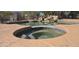 Inviting backyard pool and spa featuring custom rock waterfall feature and ample deck for entertaining at 2926 W Tanya Trl, Phoenix, AZ 85086