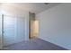Bedroom with double door closet and carpet flooring at 40000 W Bunker Dr, Maricopa, AZ 85138
