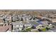 A high-angle view of residential area showcasing varied rooflines, neat landscaping, and the overall community layout at 10155 E Toledo Ave, Mesa, AZ 85212