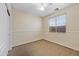 Well-lit bedroom featuring carpet and ceiling fan at 1724 S Rockwell St, Gilbert, AZ 85295