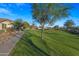 Peaceful community with lush green spaces and walking paths at 1724 S Rockwell St, Gilbert, AZ 85295