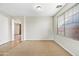 Neutral-toned dining room with tile floors and views to another room at 1724 S Rockwell St, Gilbert, AZ 85295