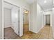 Hallway leading to bedrooms and additional rooms at 1724 S Rockwell St, Gilbert, AZ 85295